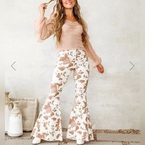 Cow print flare jeans